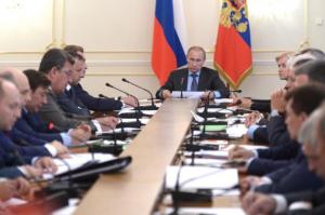 Russia's President Vladimir Putin chairs a government meeting at the Novo-Ogaryovo state residence outside Moscow
