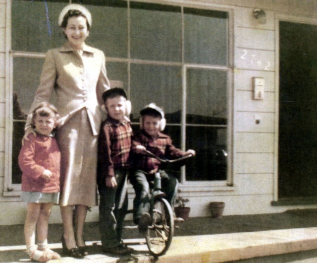 Prescos 1951 Christine, June Rice, Greg & Mark on porch