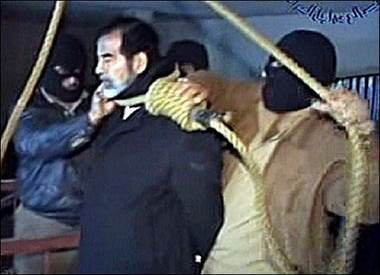 Saddam Hussein with a noose around his neck
