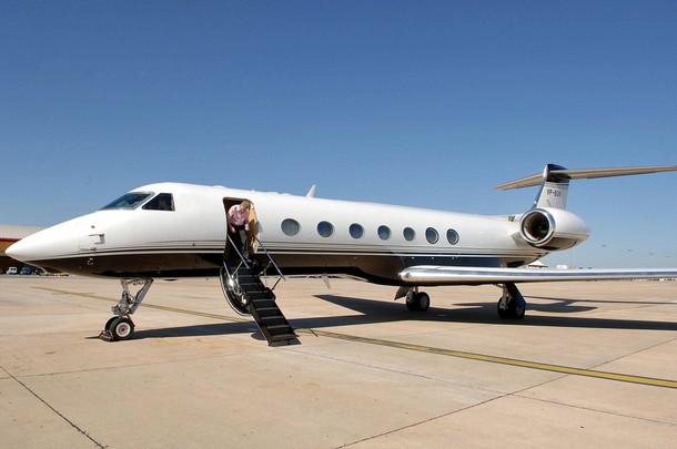 Picture taken 29 May 2007 shows Sir Philip Green's private jet put at Gerry and Kate McCann's disposal after hearing about Madeleine's abduction, at Faro airport in Portugal. Mccann couple will fly for Rome today to prepare a meeting with Pope Benedict XVI on 30 May. Madeleine, four-year old, was abducted 03 May 2007 as she was sleeping with her brother and sister in a hotel apartment at the Ocean Club Resort, while her parents were dining at a nearby restaurant. AFP PHOTO/Steve Parsons (Photo credit should read Steve Parsons/AFP/Getty Images)