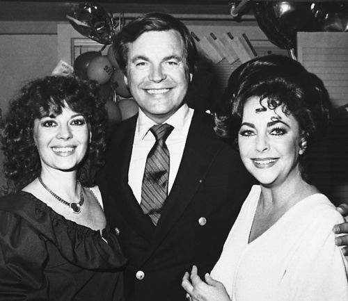 Actor Robert Wagner, center, and his wife, actress Natalie Wood, left, visit backstage with Elizabeth Taylor, June 18, 1981 in New York after seeing her star in the Broadway production of Lillian Hellman's play "The Little Foxes." (AP Photo/Roberto Borea)