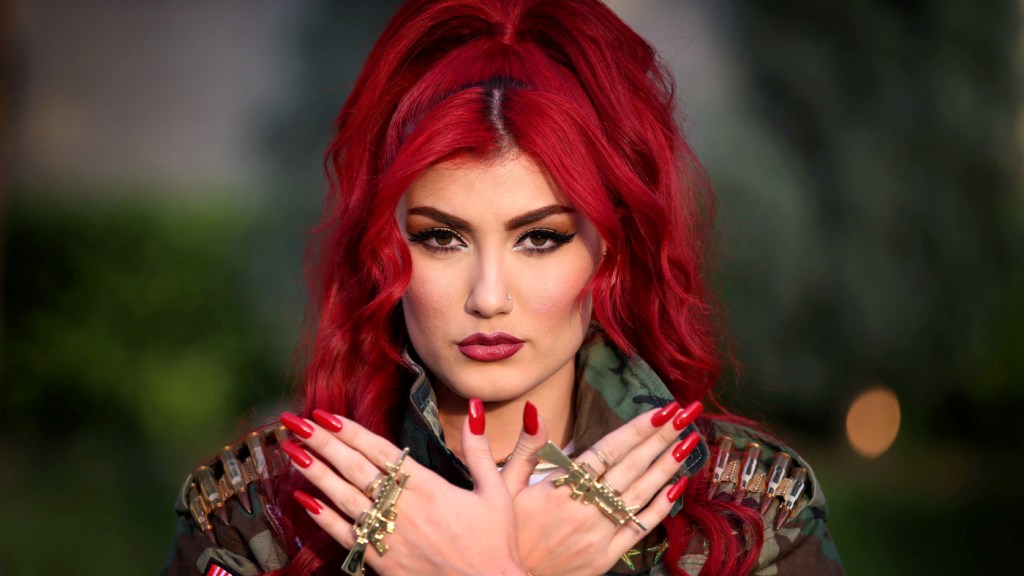 Iraqi Kurdish singer Helly Luv sings in support of Kurdish fighters, called the peshmerga, who are battling the Islamic State. Her songs are popular among Kurds in northern Iraq, though some critics say her outfits and dancing are un-Islamic.