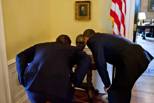 President Barack Obama shows Prime Minister David Cameron of the United Kingdom a bust of Sir Winston Churchill in the private residence of the White House, July 20, 2010. (Official White House Photo by Pete Souza)