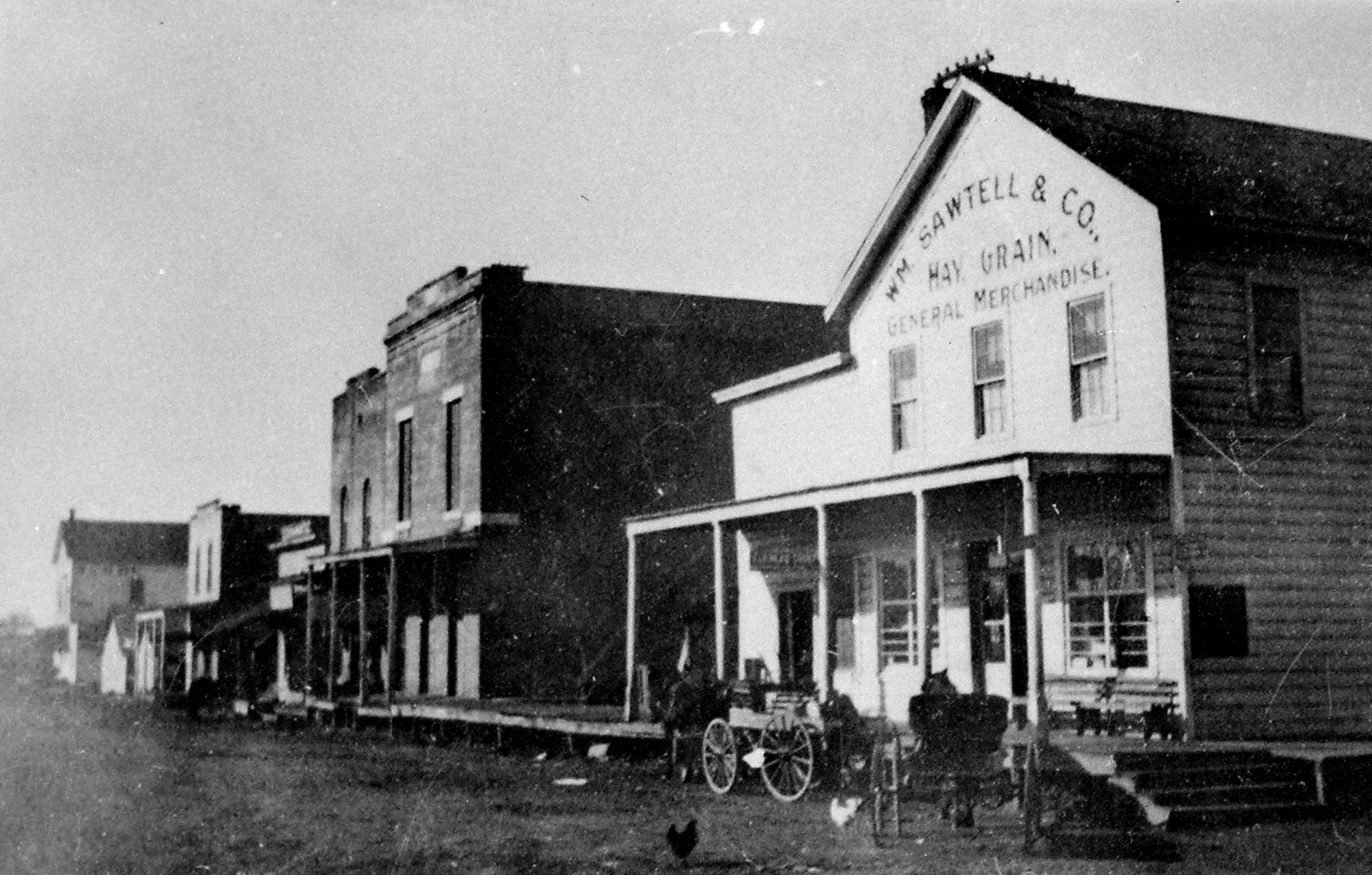 Corner of Pacific and Lincoln Streets facing the railroad tracks with the brick Odd Fellows building next door in 1905.